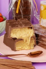 A closeup shot of a chocolate bar with cream inside