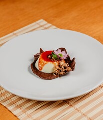 Up of a creme brulee topped with golden caramelized sugar