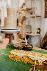 Wooden table with a variety of dishes displayed on top
