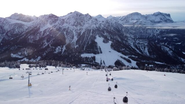 Sunrise at the ski resort Kronplatz in South Tyrol, Italy with view of the Dolomites
