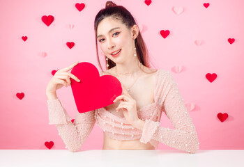 Valentine concept. Young Asian sexy woman gathered in ponytail with natural makeup on face have...