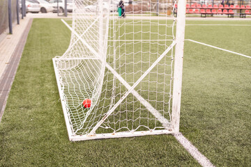 Soccer field with cloudy in the countryside.