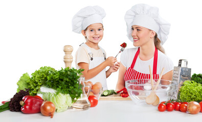 Mother and Daughter Having Fun in the Kitchen Isolated