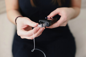 Woman placing a filled reservoir in her insulin pump