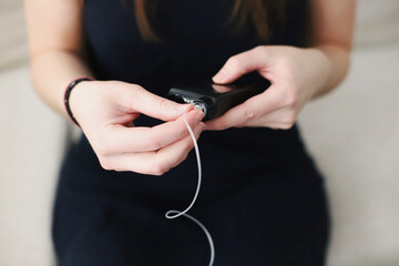 Woman placing a filled reservoir in her insulin pump