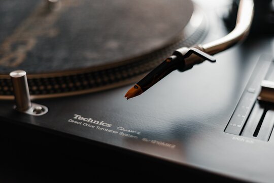 Closeup of iconic technics 1210 mk2 turntables with ortofon nightclub mk2 needle