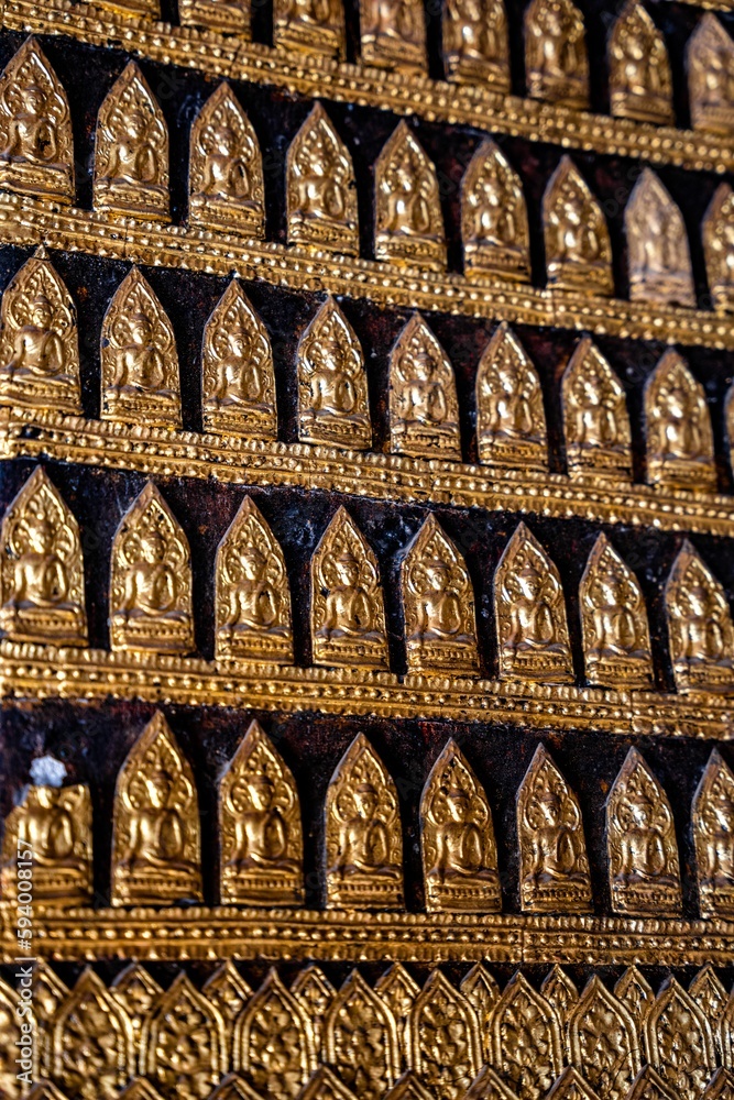 Sticker Ancient Buddha statue at Wat Visoun in Luang Prabang, Laos, Southeast Asia