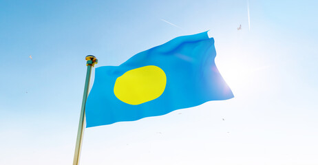 Flag of Palau waving in the wind, sky and sun background. Palau flag. 3D rendering realistic waving flag background. 