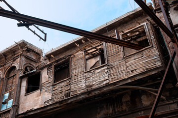Historic wooden facade of a building ruin in old town of Damascus