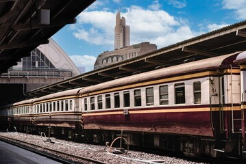 Old train at the Bangkok central station during daytime in Thailand