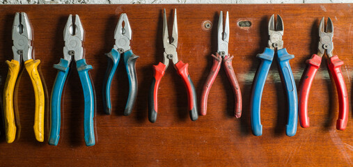 set of different pliers for the background