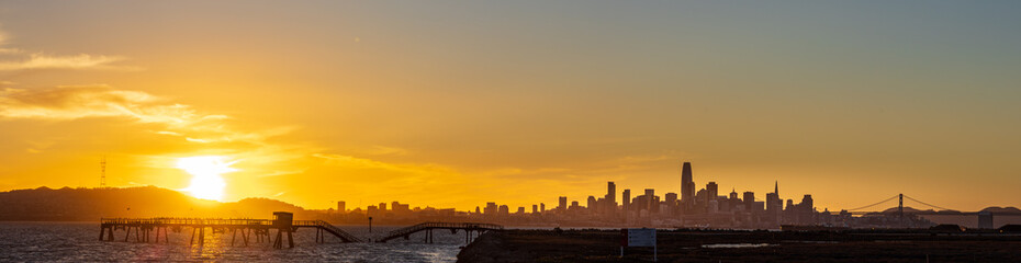 A panorama of sunset over the city of San Fransisco taken from Alameda