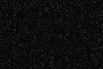 Abstract dark background of black stones texture