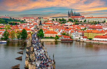Fototapeta premium Prague cityscape with Charles Bridge over Vltava river and Prague castle at sunset, Czech Republic