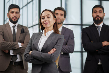 professional employees executives group posing together for corporate portrait, leadership