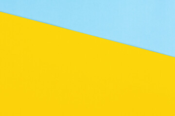 Fototapeta na wymiar Pastel yellow and blue paper texture background