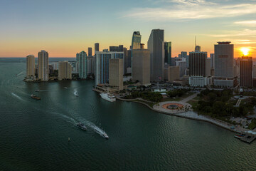 Aerial view of downtown district of of Miami Brickell in Florida, USA at sunset. High commercial...