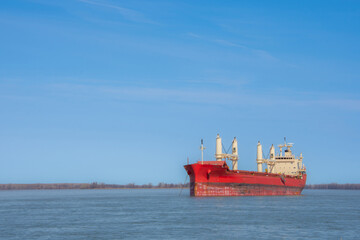 Large ship anchored in the Saint Lawrence River in Quebec, Canada
