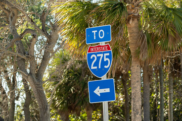 Blue direstional road sign indicating direction to I-275 freeway interstate highway serving the Tampa Bay area in Florida