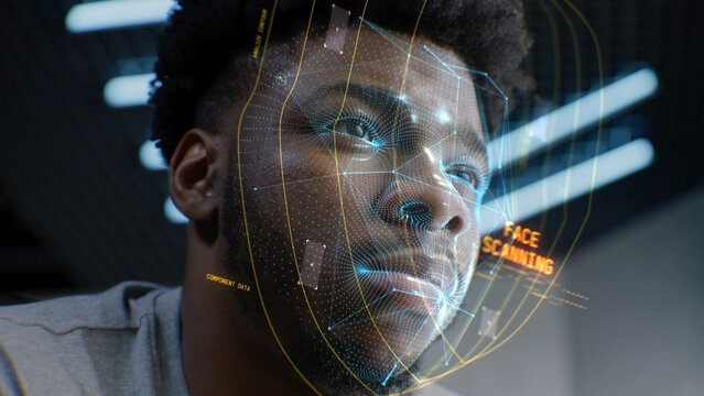 Face portrait of young African American man with focused look. 3D animation of human futuristic AI biometric face recognition system. Identification for access. Privacy and modern scanning technology.