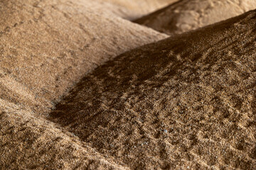 Piles of wheat grains at mill storage or grain elevator. The main commodity group in the food markets