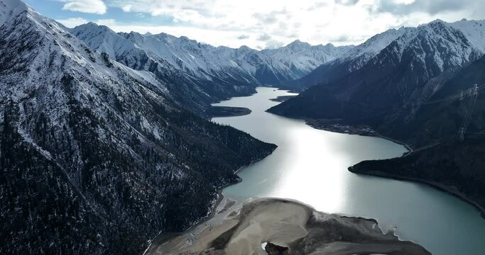 Aerial footage of beautiful snow mountains and lake in Tibet,China