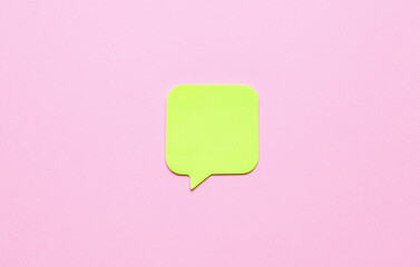 Blank paper speech bubble on pink background
