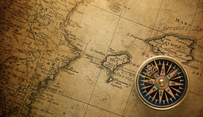 Fototapeta na wymiar Magnetic compass on world map. Travel, geography, navigation, tourism and exploration concept background. Macro photo. Very shallow focus.