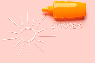 Word SUMMER with sun made of sunscreen cream on pink background