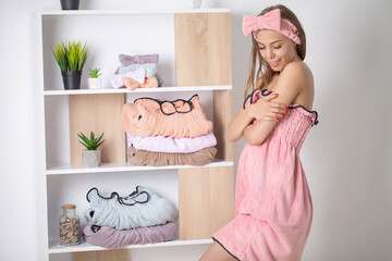 Pretty girl after shower put on a new towel dress