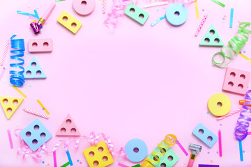 Fototapeta na wymiar Frame made of baby blocks and confetti on pink background. Children's Day celebration