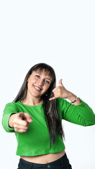 Young woman pointing to the camera with her finger, isolated on white background