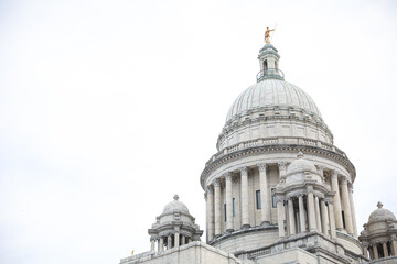 The US Capitol State House is a symbol of American democracy and government power. Its iconic design features a dome, columns, and statues, embodying the values of freedom, liberty, and national unity