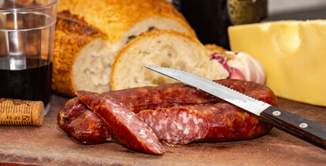 More traditional rustic Italian food, bread, salami, cheese and wine