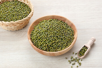 Green mung beans served on wooden bowl. Food ingredient