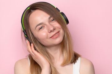 Fototapeta premium Happy woman with headphones listening to music