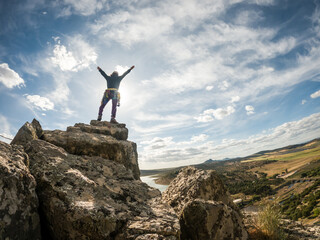 person on top of mountain