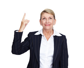 Business woman, happy and pointing up while isolated on transparent png background. Mature female manager advertising promotion, news review or presentation of deal, choice or sales offer coming soon