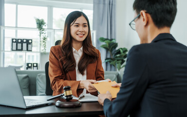 Fototapeta premium Hand over banknotes, Bribery of female asia japanese chinese lawyer people earn dollars after winning a lawsuit. extorting money from clients in legal cases