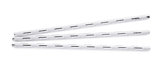 Striped paper cocktail straws on white background, top view