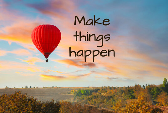 Make things happen, affirmation. Bright hot air balloon flying over countryside