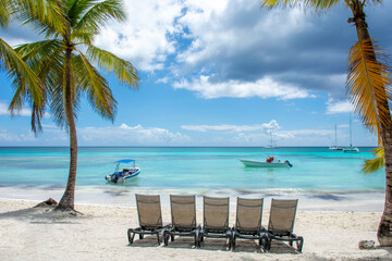 Dominican Republic, beautiful Caribbean coast with turquoise water and palm trees.