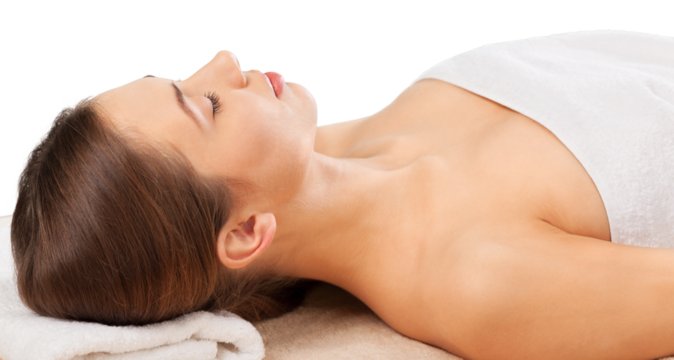 Beautiful and healthy woman relaxing in spa salon