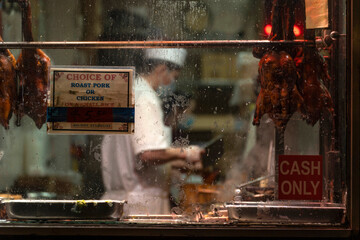 Obraz na płótnie Canvas Chinese Chef Chopping Duck