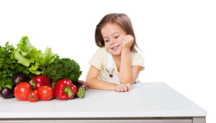 Portrait of adorable little girl preparing healthy food at kitchen