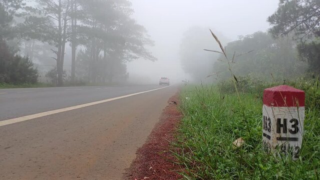 Kilometer markers on street, in highlands of Vietnam