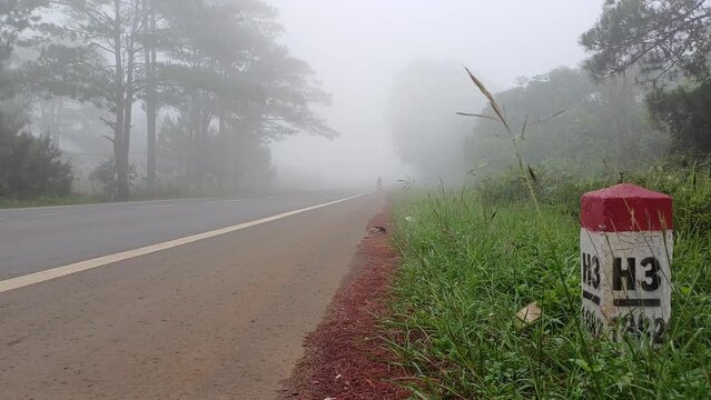 Kilometer markers on street, in highlands of Vietnam
