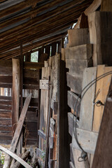 Fototapeta na wymiar Old abandoned barn that is falling apart