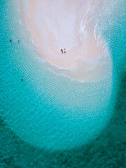 couple of men and women on the beach of Ko Lipe Island Thailand