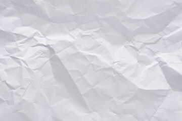 White crumpled paper texture background, clean white wrinkled paper, top view.